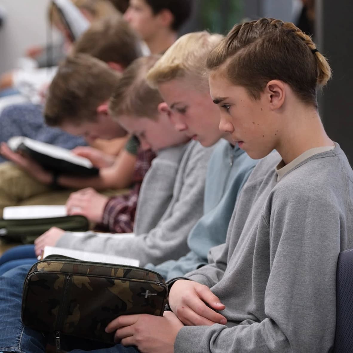 boys reading their bibles